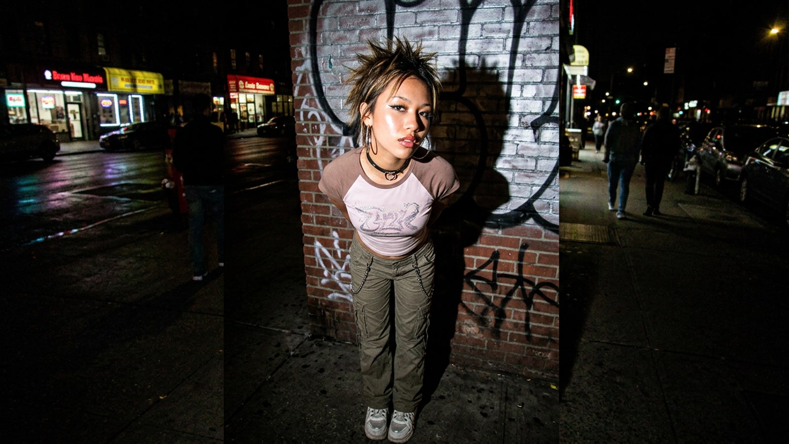 Y2K direct flash night portrait featuring harsh frontal light, specular cheekbone highlights, and a crisp background drop shadow.
